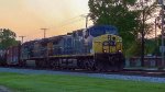 CSX AC44CW Locomotive leading a train